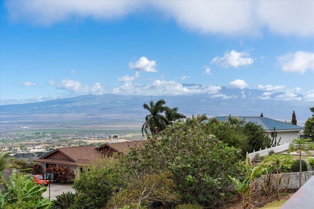 exterior space featuring a mountain view