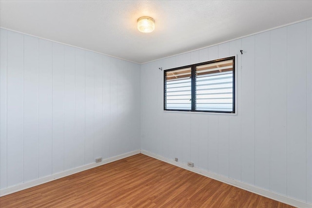 263 S Alu Rd, Wailuku, HI 96793 - spare room featuring wood finished floors and baseboards