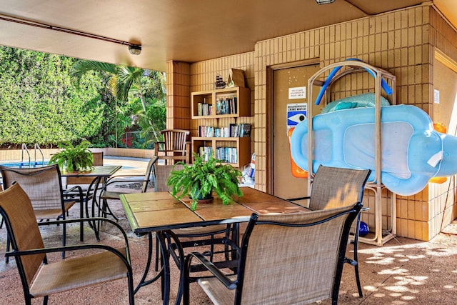 view of patio / terrace with an outdoor bar