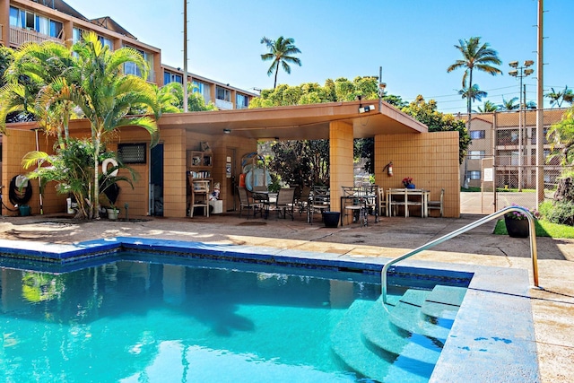 view of swimming pool featuring a patio