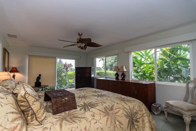 bedroom featuring ceiling fan and carpet floors