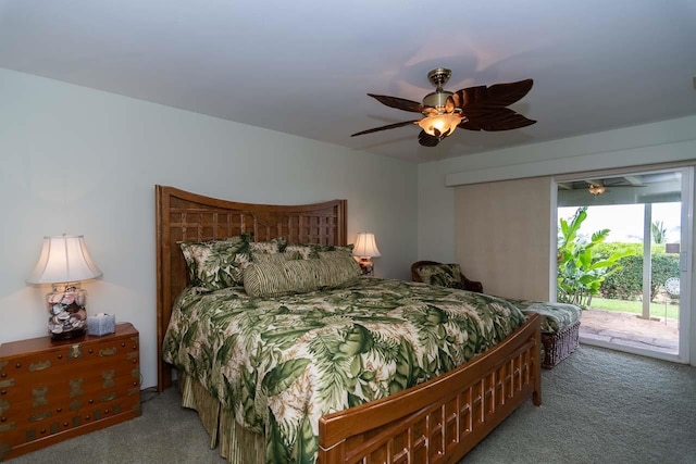 bedroom with dark colored carpet, ceiling fan, and access to exterior