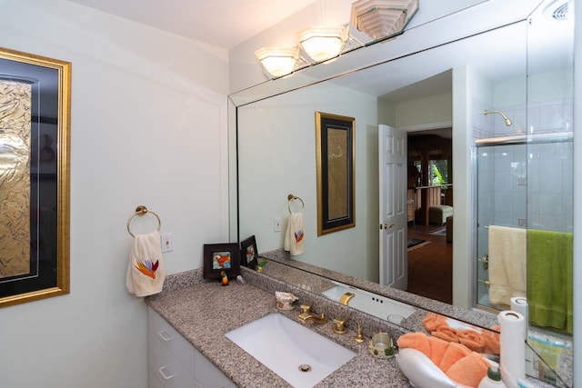 bathroom with vanity with extensive cabinet space