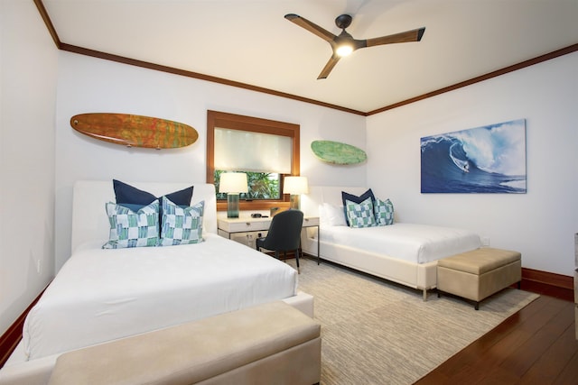 1 Bay Dr Unit 1205, Lahaina, HI 96761 - bedroom with wood finished floors, ornamental molding, ceiling fan, and baseboards