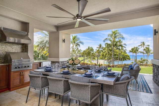 1 Bay Dr Unit 1205, Lahaina, HI 96761 - view of patio with outdoor dining space, a ceiling fan, and a water view