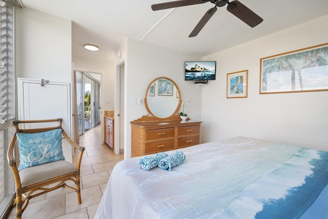 2450 S Kihei Rd Unit 506, Kihei, HI 96753 - bedroom with light tile patterned flooring and a ceiling fan