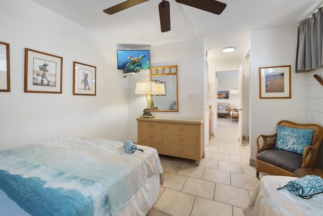 2450 S Kihei Rd Unit 506, Kihei, HI 96753 - bedroom with light tile patterned floors and a ceiling fan
