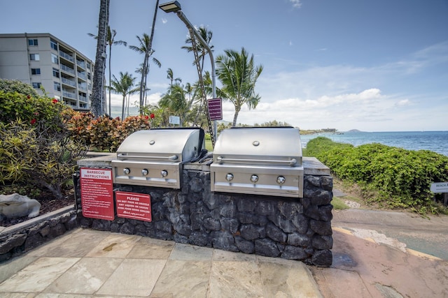 2450 S Kihei Rd Unit 506, Kihei, HI 96753 - view of patio / terrace with a water view