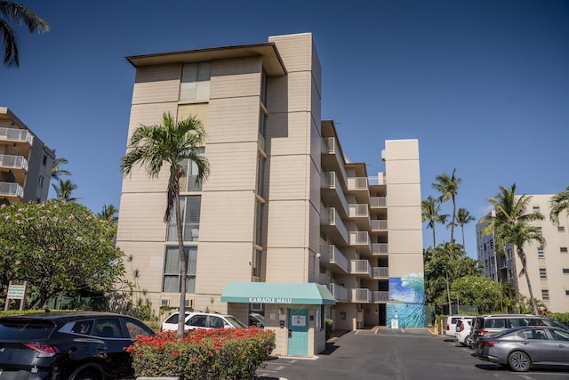 2450 S Kihei Rd Unit 506, Kihei, HI 96753 - view of apartment building / complex featuring uncovered parking