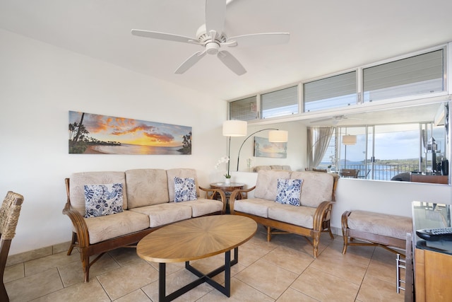2450 S Kihei Rd Unit 506, Kihei, HI 96753 - living area featuring a ceiling fan, light tile patterned flooring, and baseboards