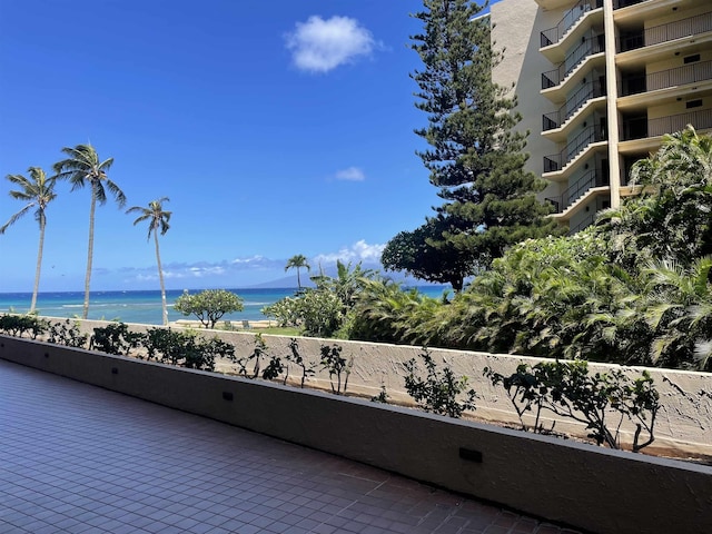 view of patio featuring a water view