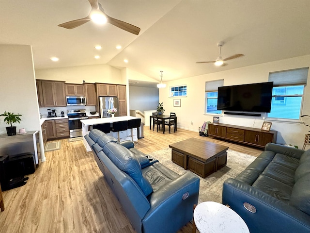 24 Kupaloke St, Wailuku, HI 96793 - living area with a ceiling fan, light wood-type flooring, and vaulted ceiling