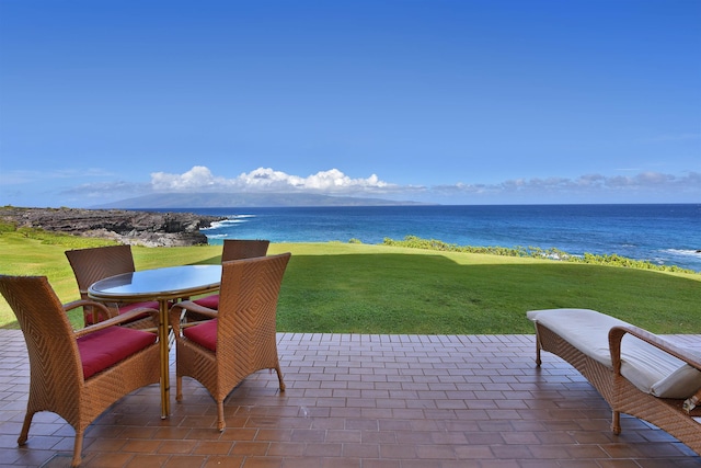 view of patio / terrace with a water view