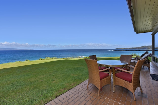 view of patio featuring a water view