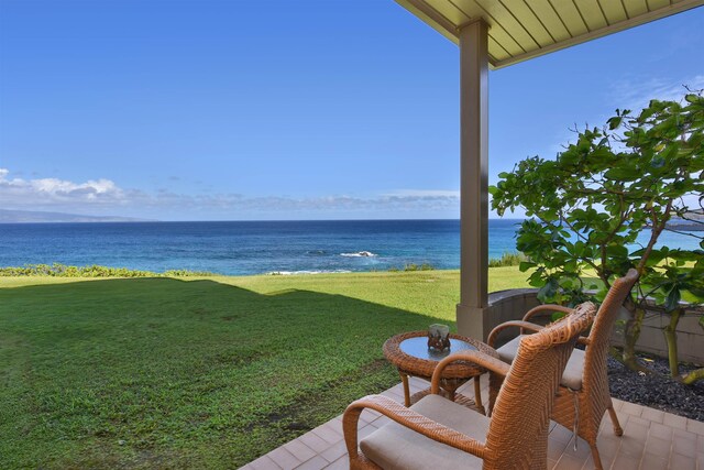 exterior space with a water view