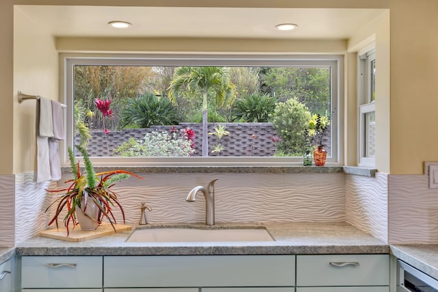 room details with light countertops and a sink