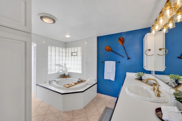 bathroom with a garden tub, visible vents, vanity, tile patterned flooring, and baseboards