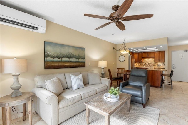 tiled living room with a wall unit AC and ceiling fan