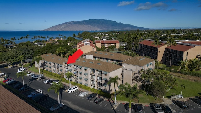 bird's eye view featuring a water and mountain view