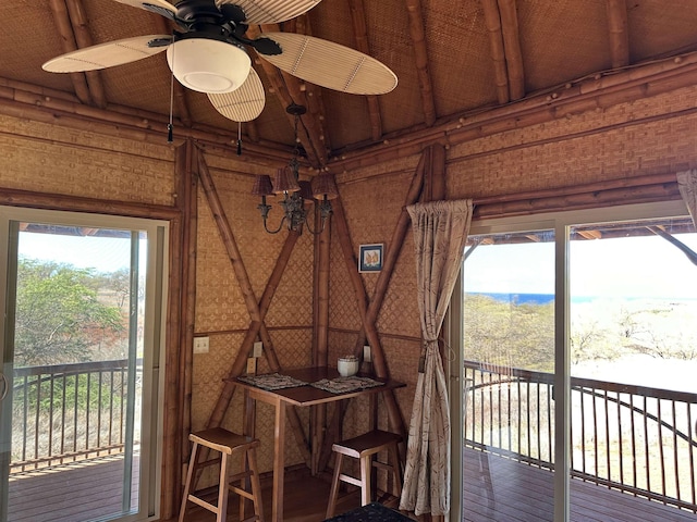 interior space with a ceiling fan and a healthy amount of sunlight
