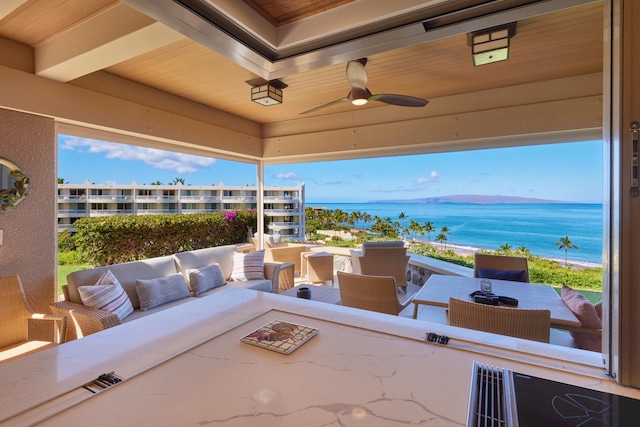 4000 Wailea Alanui Dr Unit 3003, Kihei, HI 96753 - view of patio with outdoor lounge area, a water view, a ceiling fan, and outdoor dining area