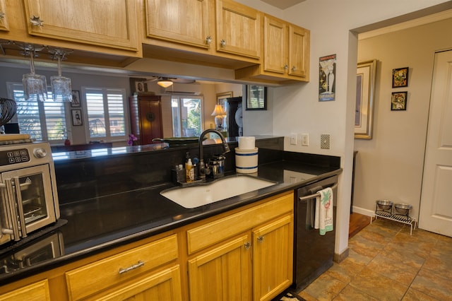 kitchen with stainless steel dishwasher, tile patterned floors, and sink