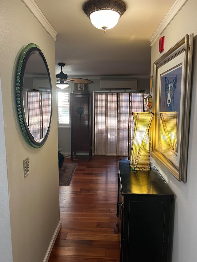 hallway featuring ornamental molding, dark wood-type flooring, and a wall mounted air conditioner