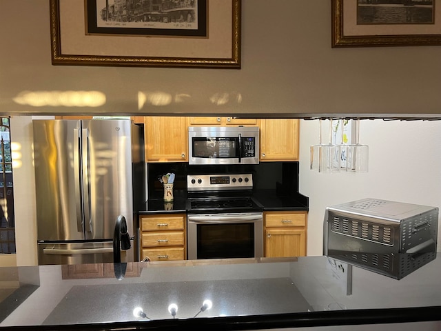 kitchen with appliances with stainless steel finishes