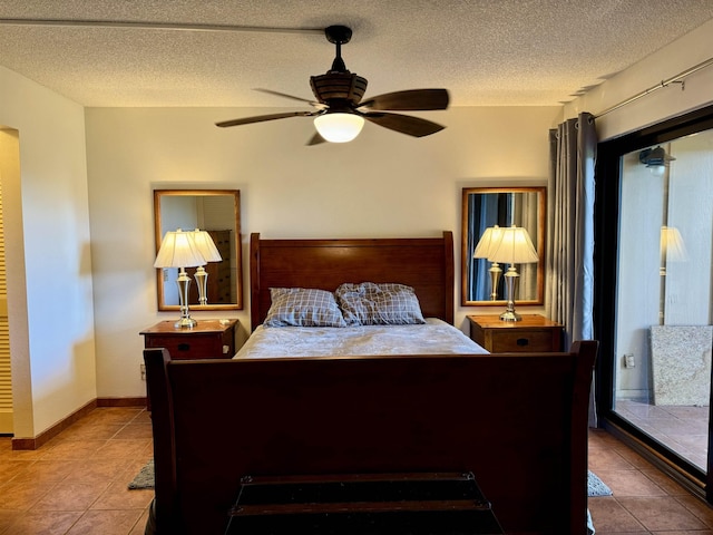 50 Kepuhi Pl Unit 103, Maunaloa, HI 96770 - bedroom with tile patterned flooring, a textured ceiling, multiple windows, and ceiling fan