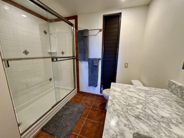 50 Kepuhi Pl Unit 103, Maunaloa, HI 96770 - full bathroom with a shower stall, tile patterned floors, and vanity
