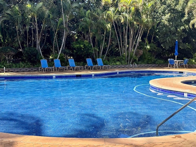 50 Kepuhi Pl Unit 103, Maunaloa, HI 96770 - community pool featuring a patio