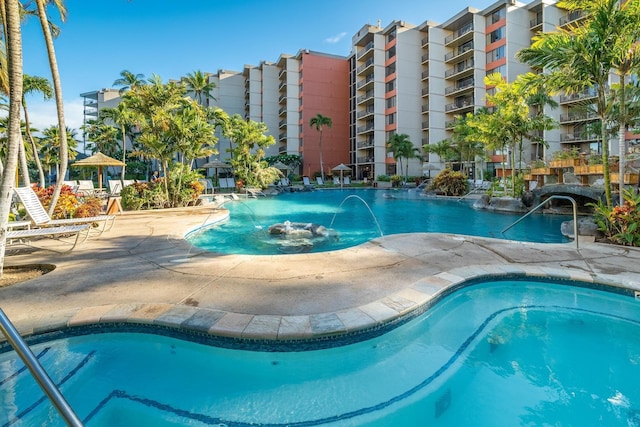 view of pool featuring pool water feature