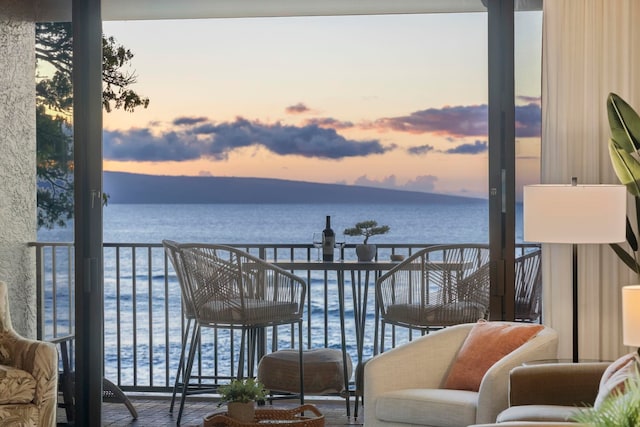 balcony at dusk with a water view