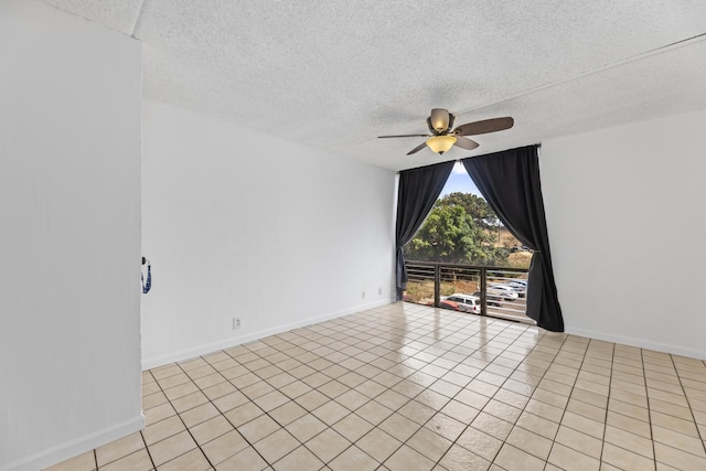 3676 Lower Honoapiilani Rd Unit G302, Lahaina, HI 96761 - unfurnished room featuring ceiling fan, a textured ceiling, and light tile patterned flooring