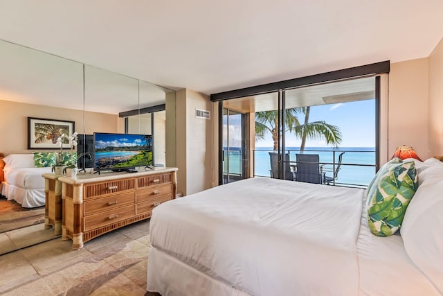 110 Kaanapali Shores Pl Unit 308, Lahaina, HI 96761 - bedroom with access to outside