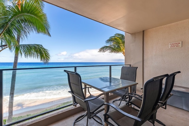 110 Kaanapali Shores Pl Unit 308, Lahaina, HI 96761 - balcony with view of water and beach and outdoor dining space