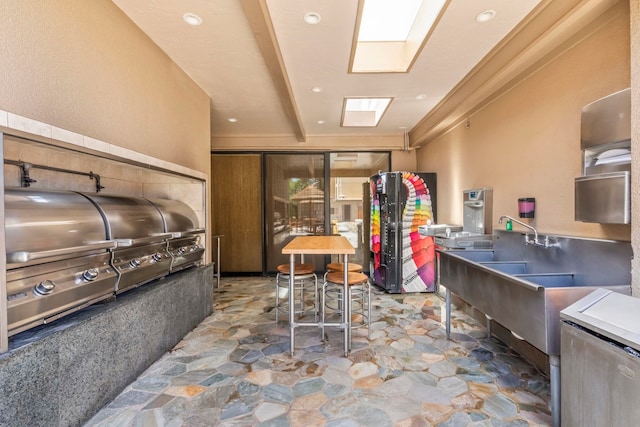 110 Kaanapali Shores Pl Unit 308, Lahaina, HI 96761 - kitchen featuring stone floors