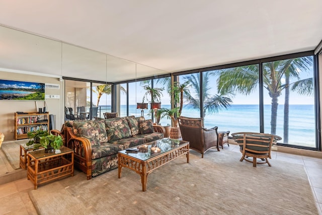 110 Kaanapali Shores Pl Unit 308, Lahaina, HI 96761 - tiled living room featuring plenty of natural light, a water view, and floor to ceiling windows
