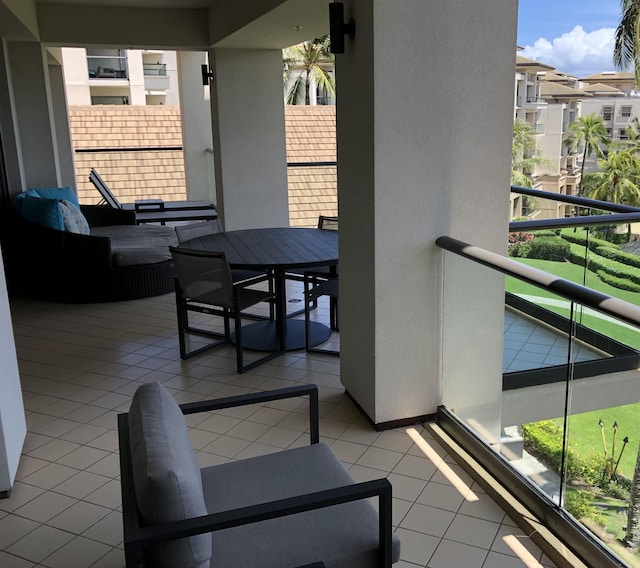 balcony with outdoor dining area