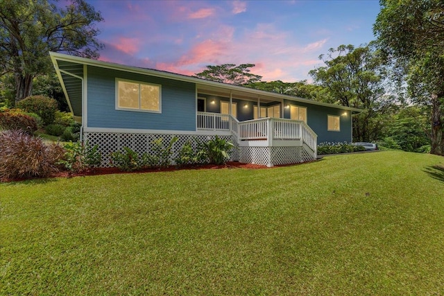 view of front of home featuring a yard