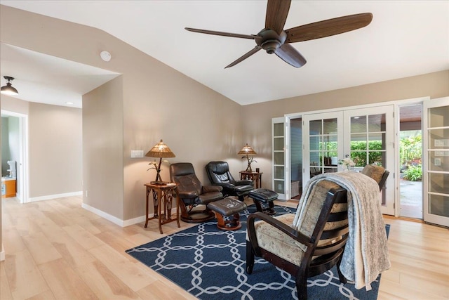 interior space with french doors, light hardwood / wood-style flooring, ceiling fan, and lofted ceiling