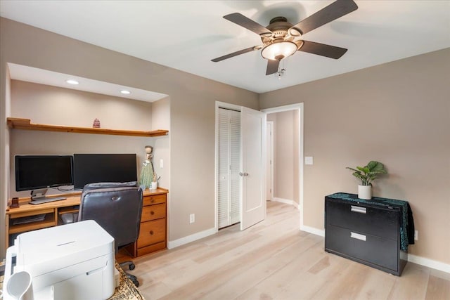 office area featuring ceiling fan and light wood-type flooring