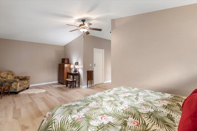 bedroom featuring wood-type flooring, ceiling fan, and lofted ceiling