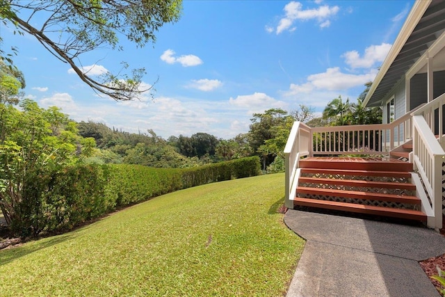 view of yard with a deck