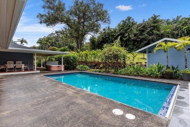 view of pool featuring a patio