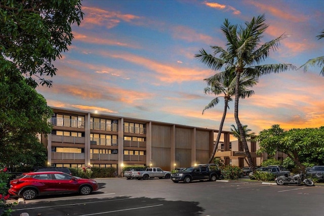 view of outdoor building at dusk