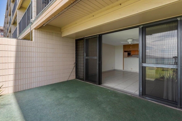 view of patio / terrace with a balcony