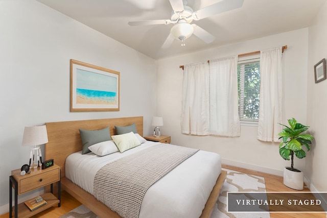 40 Halili Ln Unit 4D, Kihei, HI 96753 - bedroom with wood finished floors and ceiling fan