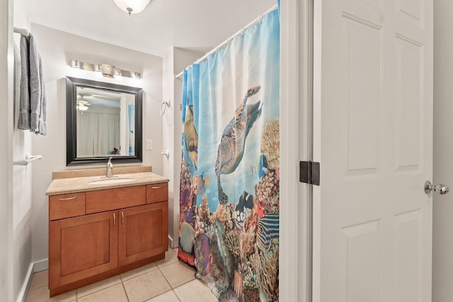 40 Halili Ln Unit 4D, Kihei, HI 96753 - bathroom featuring tile patterned floors, vanity, and a shower with shower curtain