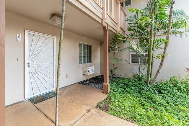 40 Halili Ln Unit 4D, Kihei, HI 96753 - doorway to property featuring stucco siding